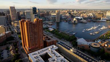 Aerial Drone View of Baltimore City Harbor at Sunset