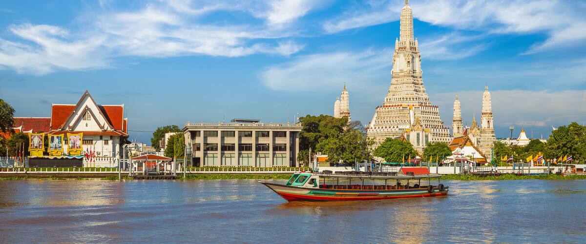 Wat Arun by Chao Phraya River at Bangkok, thailand