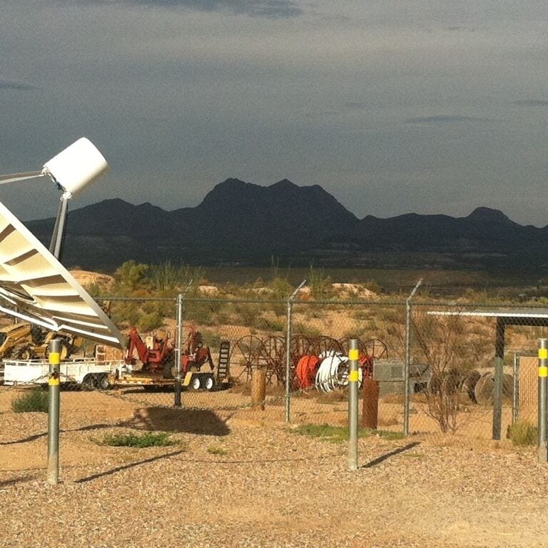Triplet Mountain from the yard at work. It's shadowed like that from clouds that had dropped rain on us and moved north about 4 hours before this picture. 