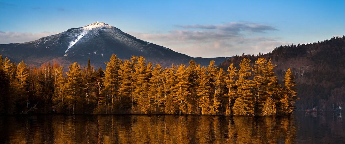 Snowy Whiteface mountain with reflections in Paradox Bay, Lake Placid, Upstate New York