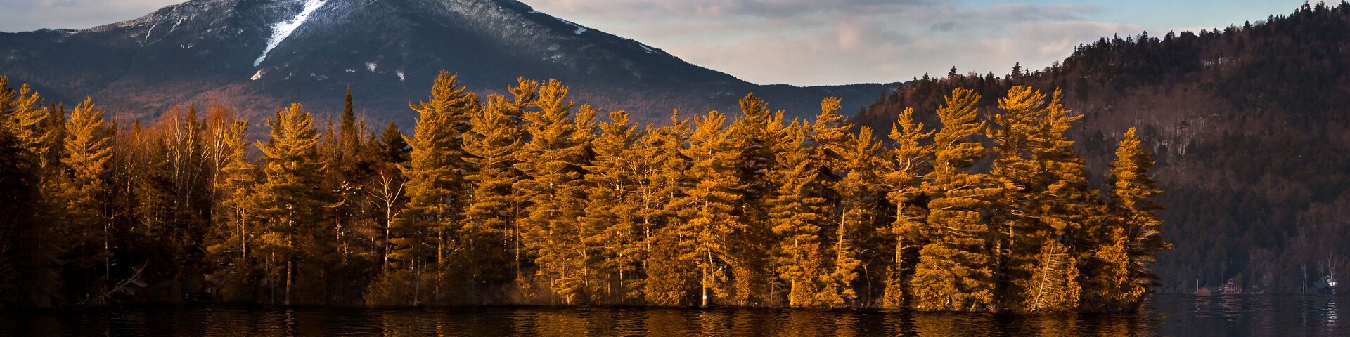 Snowy Whiteface mountain with reflections in Paradox Bay, Lake Placid, Upstate New York