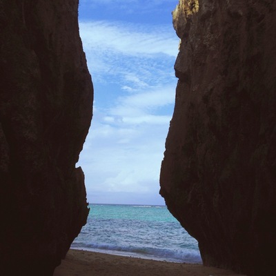 I'm sure this place has a proper name since it is so popular. You can park your car on the side of the road, walk down a well cleared path, complete with man made natural stairs ( that's an oxymoron but it's the best way to describe it) it's a very narrow clean beach between two gigantic rock formatiosn. Very stunning though this picture doesn't do it justice, it's an odd place to shoot.