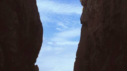 I'm sure this place has a proper name since it is so popular. You can park your car on the side of the road, walk down a well cleared path, complete with man made natural stairs ( that's an oxymoron but it's the best way to describe it) it's a very narrow clean beach between two gigantic rock formatiosn. Very stunning though this picture doesn't do it justice, it's an odd place to shoot.