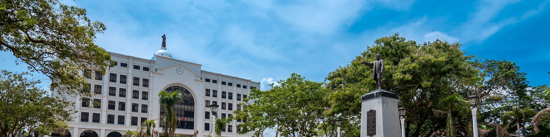Iloilo City, Philippines - A statue of Jose Rizal found at the historic Plaza Libertad, and Iloilo City Hall.