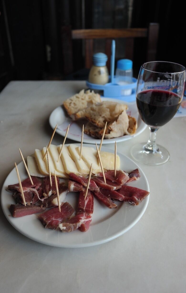 #TroveOn 
Each year countries around the world celebrate Mardi Gras and then 40 days later the resurrection of Christ.  

While in Loule, Portugal during this time of feasting we visited Cafe Calcinha.  Cafe Calcinha is one of the oldest cafes in Loule.  And if you're looking to enjoy a moment, it's easy to find by looking for the bronze statue of Antonio Aleixo.  He is sitting outside just welcoming a picture or to share a bica.