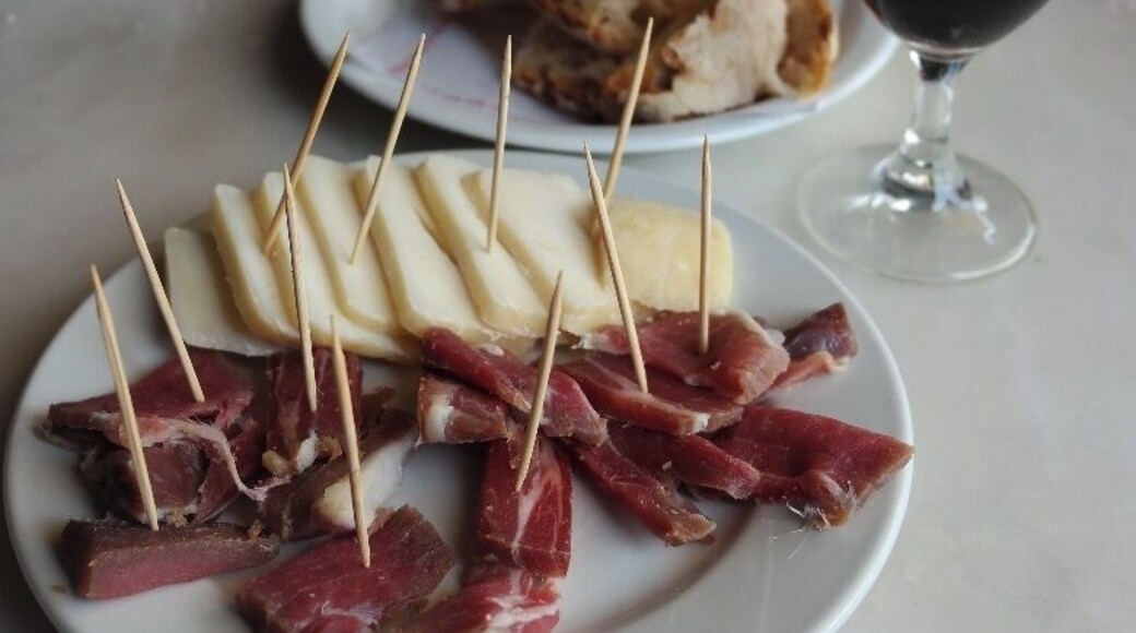 #TroveOn
Each year countries around the world celebrate Mardi Gras and then 40 days later the resurrection of Christ.
While in Loule, Portugal during this time of feasting we visited Cafe Calcinha. Cafe Calcinha is one of the oldest cafes in Loule. And if you're looking to enjoy a moment, it's easy to find by looking for the bronze statue of Antonio Aleixo. He is sitting outside just welcoming a picture or to share a bica.