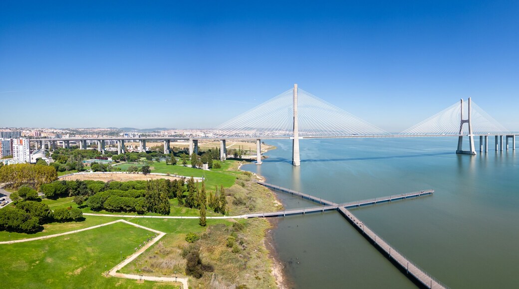 Aerial footage Vasco da Gama bridge at Park of The Nations in Lisbon (Parque das Nações)