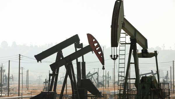 Daytime view of crude oil extraction in the Oildale area near Bakersfield