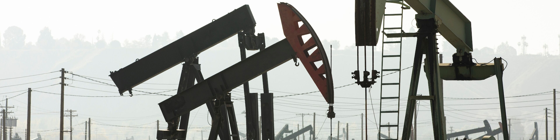 Daytime view of crude oil extraction in Bakersfield, California, USA.