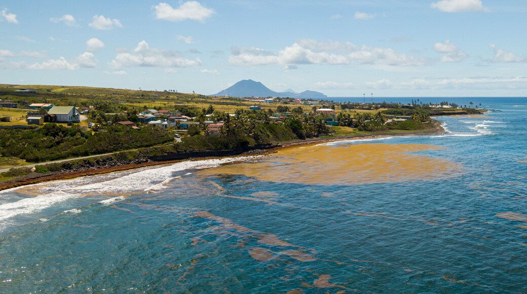 Saddlers Village which includes a coastal town, landscape views and general coastal views