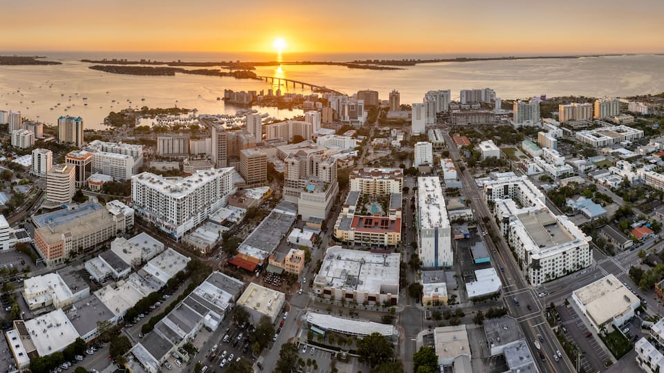 Sarasota, Florida city architecture at sunset. High-rise office buildings in downtown district. Real estate development in Florida. USA travel destination