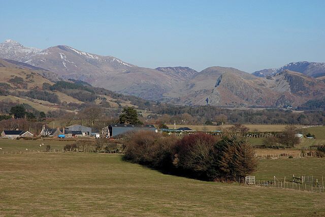 View up Dyffryn Dysynni Looking over Waenfach farm to the valley, with the well-known Birds' Rock / Craig yr Aderyn clearly visible on the right. Cadair Idris and Mynydd Pencoed form the left skyline.