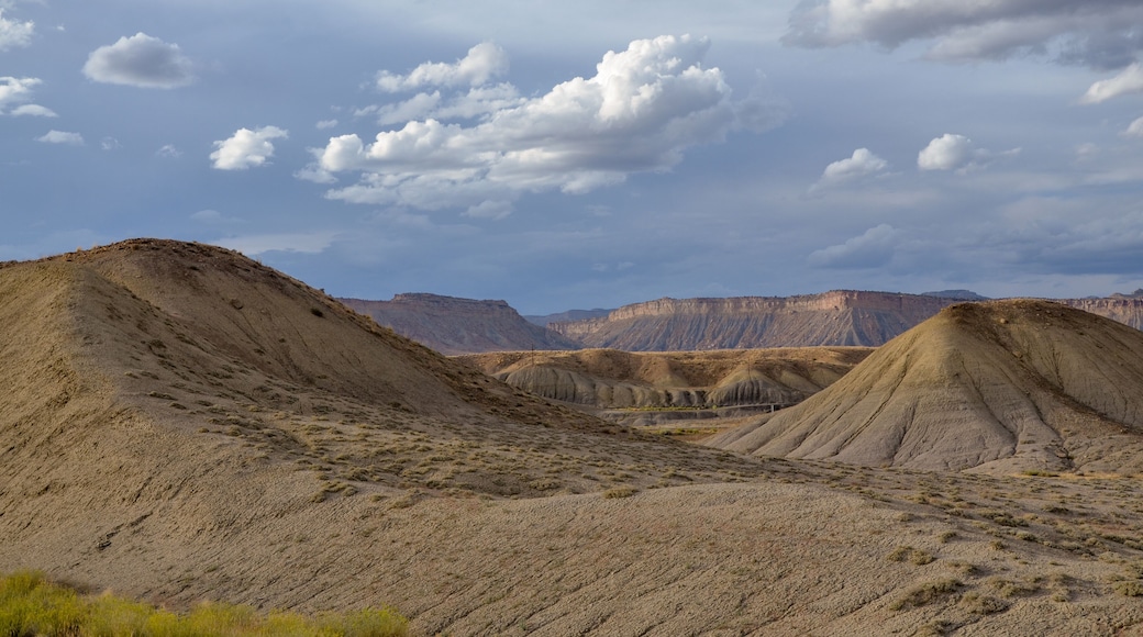 white clouds over Christmas Ridge and deserted hills near Crescent Junction, Grand County, Utah