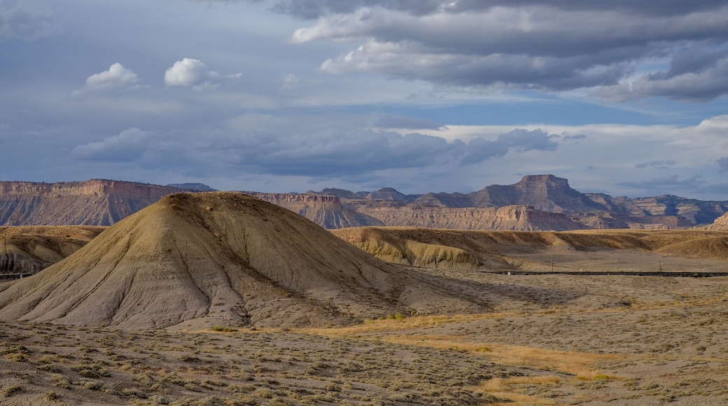 white clouds over Christmas Ridge and deserted hills near Crescent Junction, Grand County, Utah