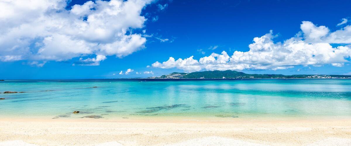 Beautiful view of tropical blue sea or ocean by the white beach and floating a cloud in summer, Okinawa in Japan, Nobody, Landscape or travel, High resolution over 50MP for wallpaper