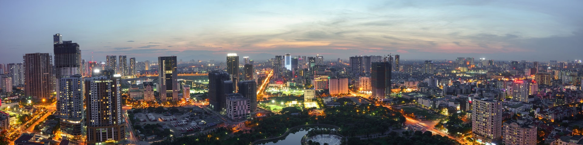 Cityscape of Hanoi skyline at Cau Giay park during sunset time in Hanoi city, Vietnam