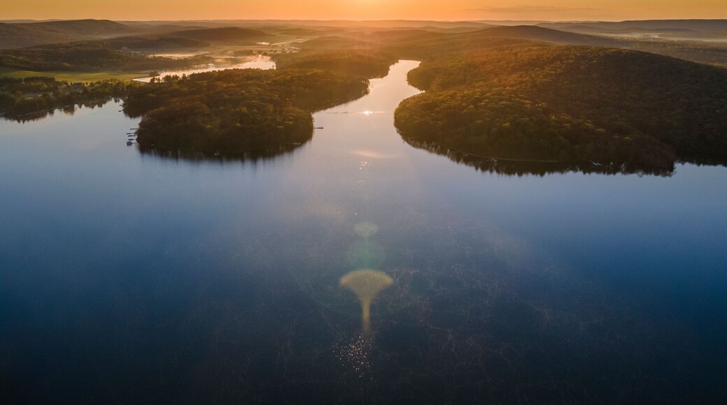Aerial view of the sunrise over Deep Creek Lake in McHenry Maryland, United States.