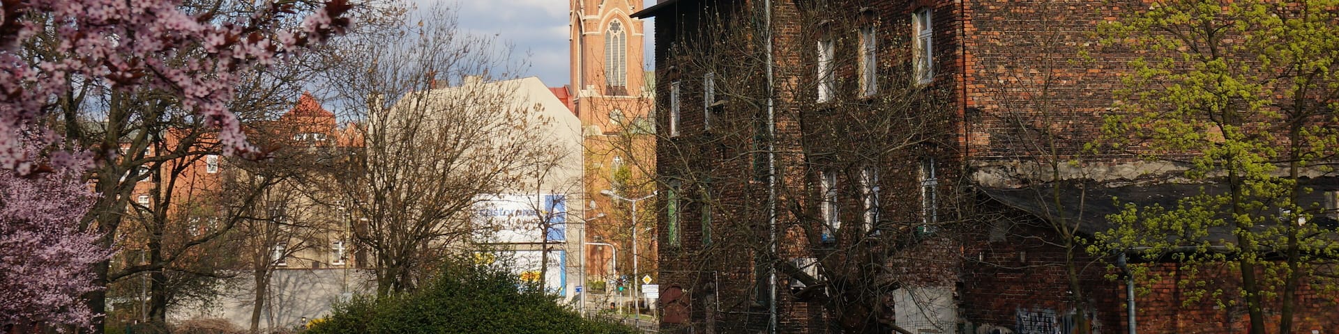 Corner of the city. Saint Stephen's Church in background, spring in Bogucice neighbourhood. Katowice, Poland.