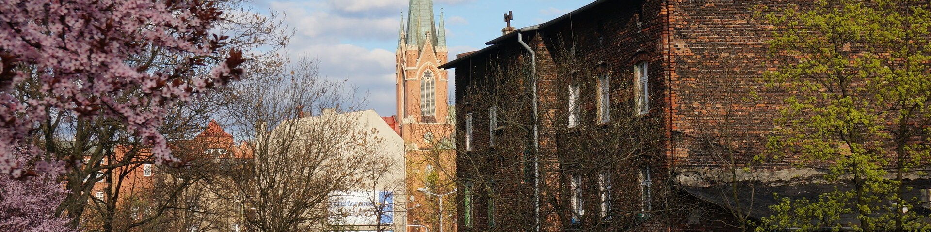 Corner of the city. Saint Stephen's Church in background, spring in Bogucice neighbourhood. Katowice, Poland.