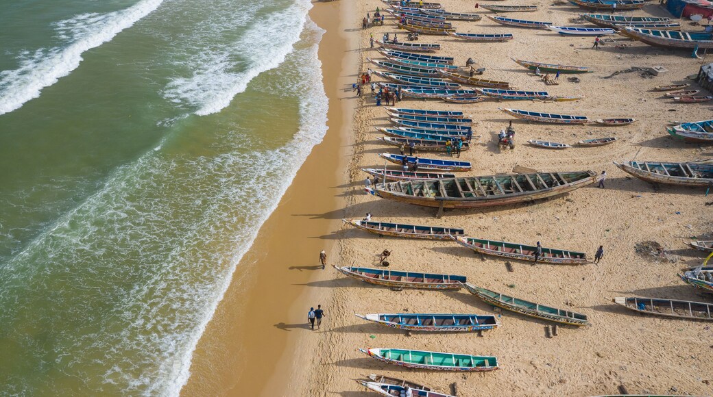 Aerial view of fishing village, pirogues fishing boats in Kayar, Senegal. Photo made by drone from above. Africa Landscapes.