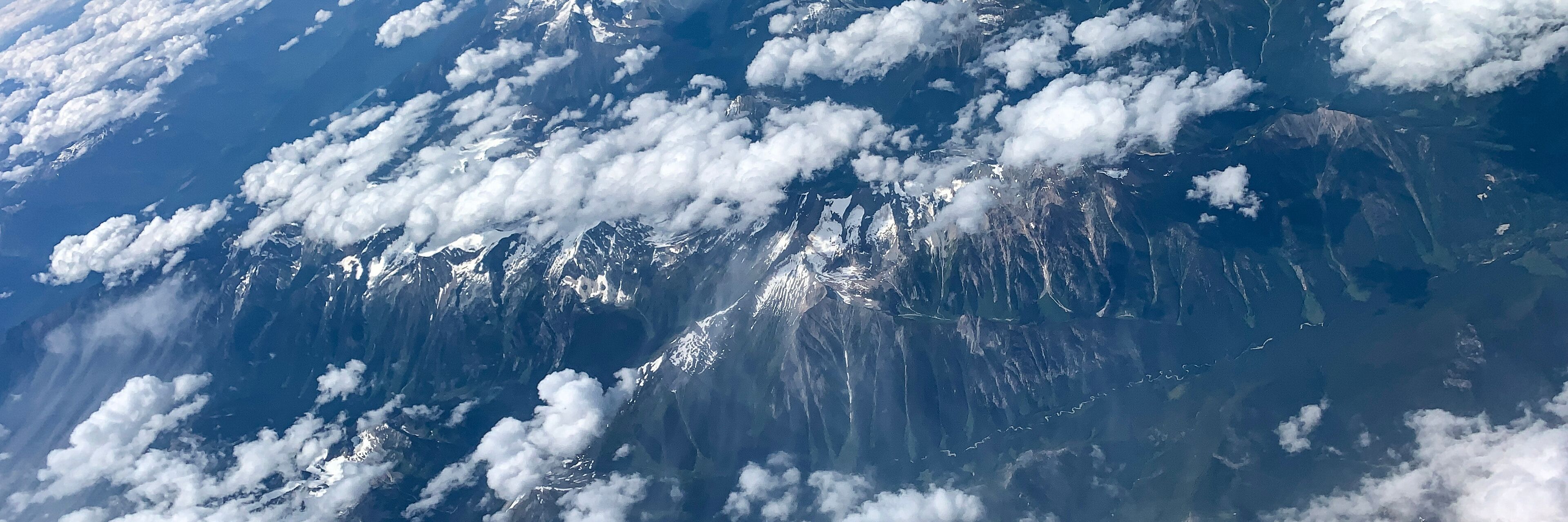 Panoramic aerial view of snowy mountains near East  Kootenay district of British Columbia, Canada