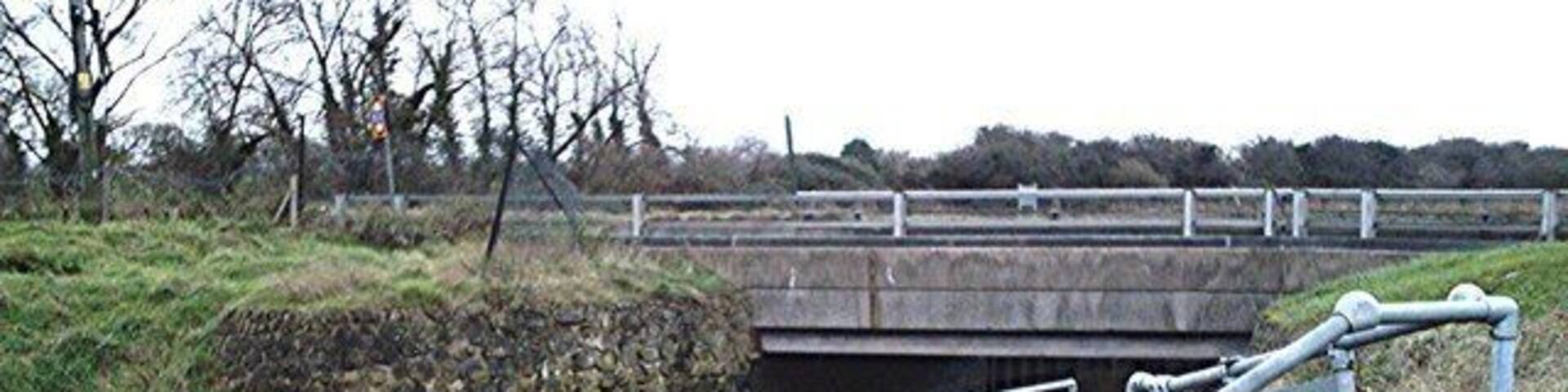 Sutton Ford Bridge The Prittle Brook, here tidal and forming the southern arm of the Roach Estuary. It has flowed through prettier places than this bleak industrial estate.