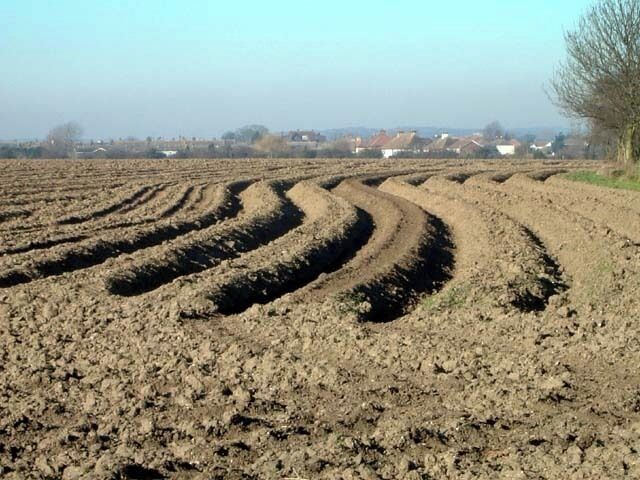 Sutton Looking East Deep ploughed arable land off Sutton Road near Southend-on-Sea. Southend Municipal Airport is beyond the distant houses.
