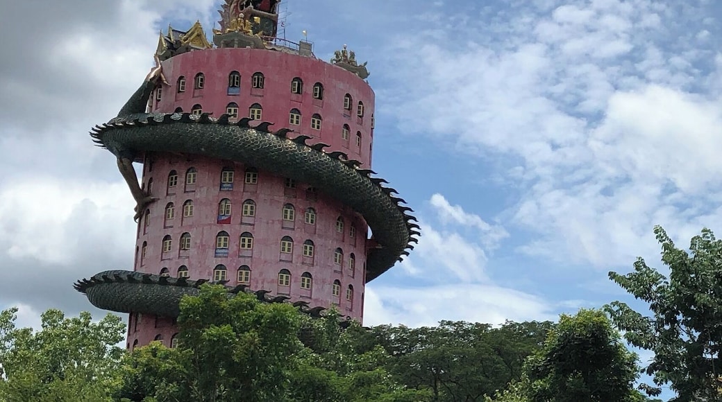 To go to the top of this tower, walk inside the dragon's body.