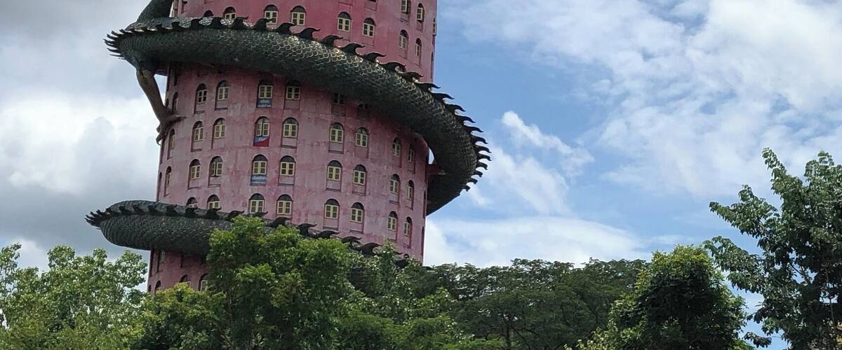 To go to the top of this tower, walk inside the dragon's body.