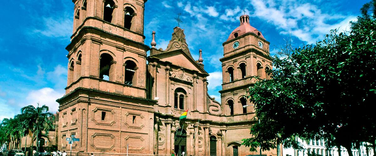 A historic church with two prominent bell towers and intricate architectural details.