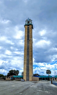 Other than its actual existence began in 1960, seemingly every other 'fact' about the Lake Placid Tower contains conflicting information.
It's either 240 ft or 270 ft tall. It's either made from concrete blocks, reinforced concrete, or limestone. It may or may not have been the world's greatest concrete block building when it opened.
The tower was built to capitalize on the 40 mile scenic view and the numerous lakes and caladium fields that surround Lake Placid, on the Central Florida Ridge.
The tower closed to visitors in the early 80's due to lack of interest. Ownership changed hands and the tower began receiving visitors a couple years later. The tower is closed seemingly for good as of sometime in the 2000's.
The structure that once touted the "highest payphone in Florida" now operates solely as a cell phone tower.
#Trovember