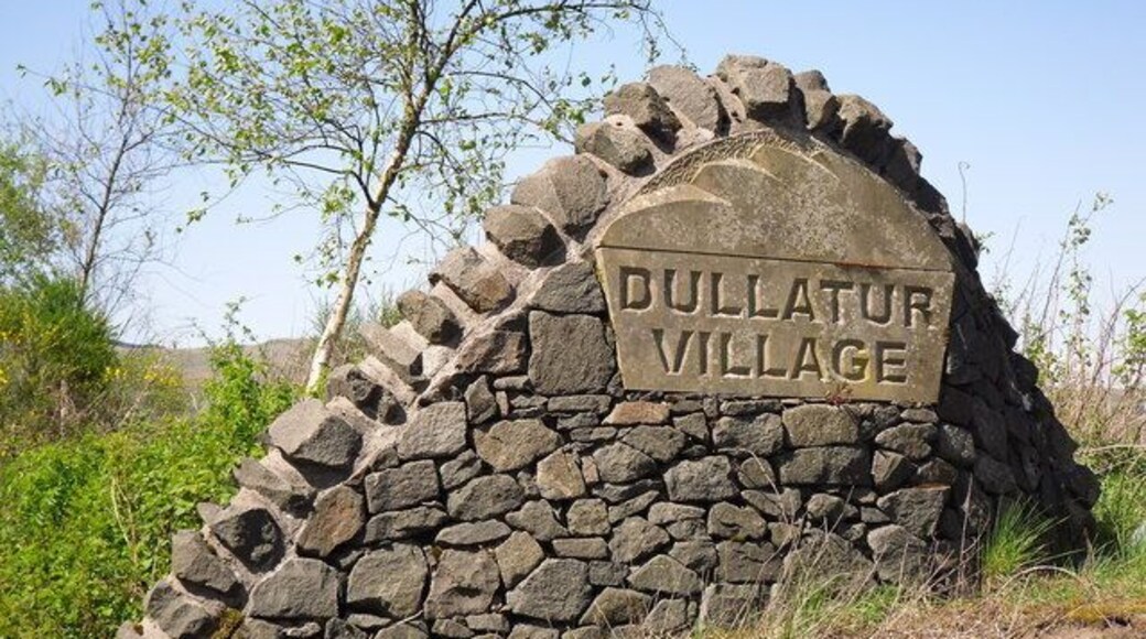 Dullatur Village This large sign can be found at the entrance to Dullatur Village from the approach from Cumbernauld.