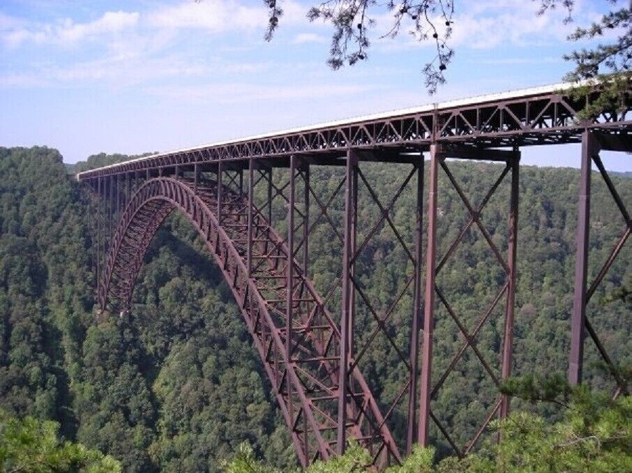 My sisters and I found this giant red iron bridge on a road trip adventure. It was magnificent. They do all kinds of great activities here like zip lining, bungee jumping and white water rafting.