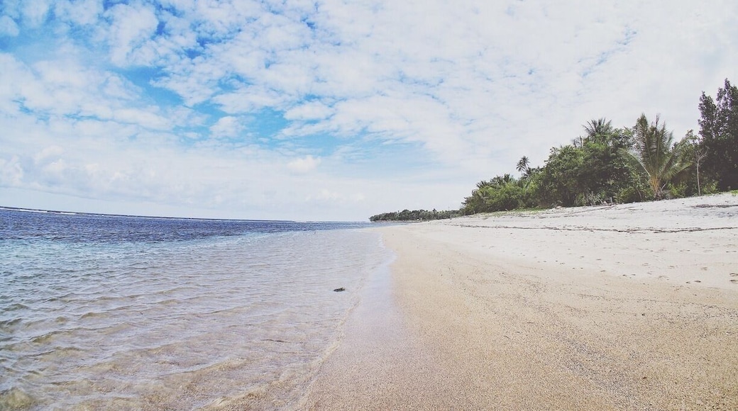 • Kora Kora Beach •
This white sand beach is a hidden paradise is North Sulawesi.
Long beautiful white sand coastline, it's a very quiet beach and you can hear the calming waving sounds along with the insects singing!
There are some local cottages around here.
Not so many things that you can do here except relaxing and enjoying the beach.
You might surf but it's not popular yet here, because the sea wave isn't that big.
It's far from everywhere but during the road trip to this place you'd see beautiful sceneries! I suggest you to ask locals the hot spot on the one of the hills, so you can see the breathtaking view of this unending white beach.