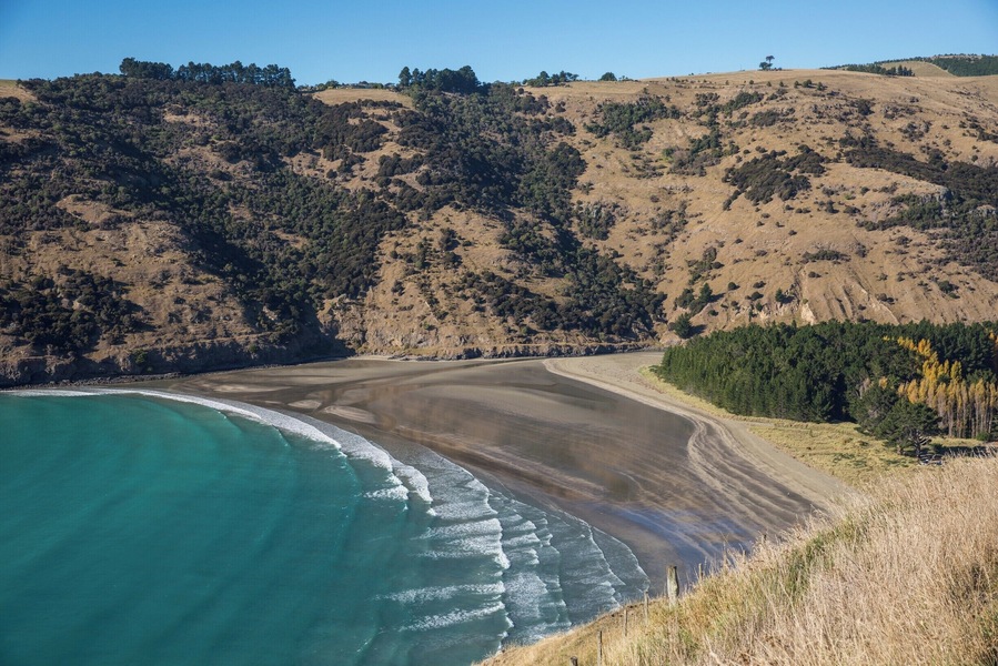 Le Bons Bay is a classic kiwi holiday area on the Banks Peninsula with some good surfing