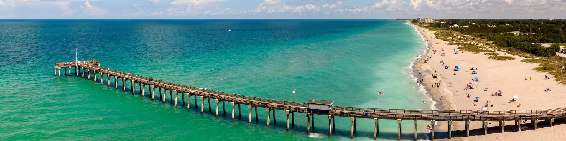 Bright ocean landscape at Venice fishing pier in Florida, USA. Popular vacation place in south