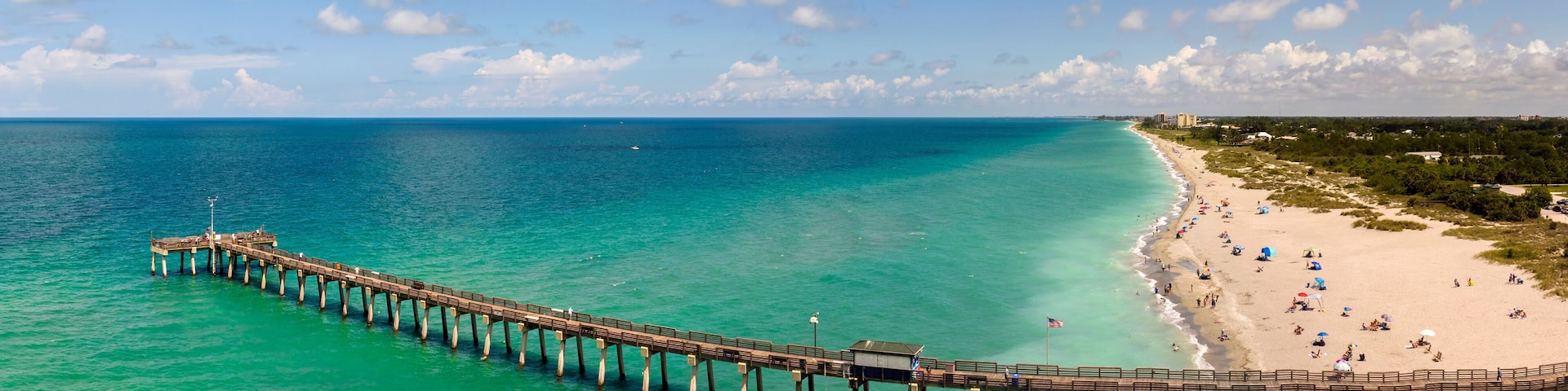 Bright ocean landscape at Venice fishing pier in Florida, USA. Popular vacation place in south