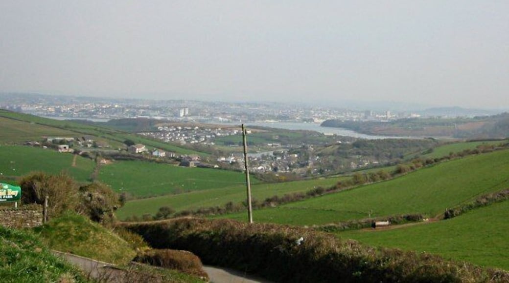 Hillside above Millbrook Taken from the roadside by Whitsands Bay Holiday Park, this shot looks across the pasture fields of this square and beyond to Millbrook and Plymouth. Behind the photographer are the cliffs of Whitsands Bay.