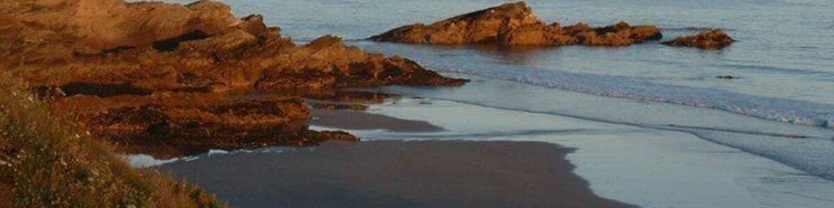 Rame Head from Freathy beach Glowing in evening sunlight