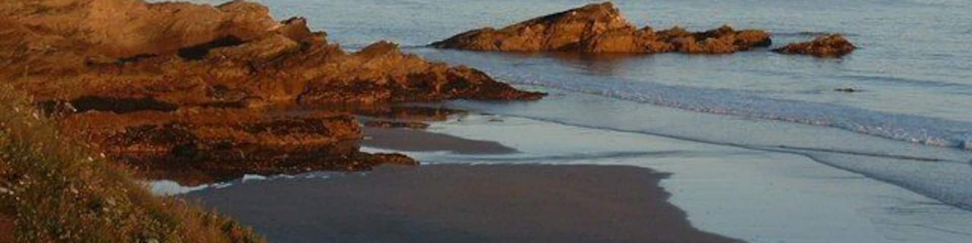Rame Head from Freathy beach Glowing in evening sunlight