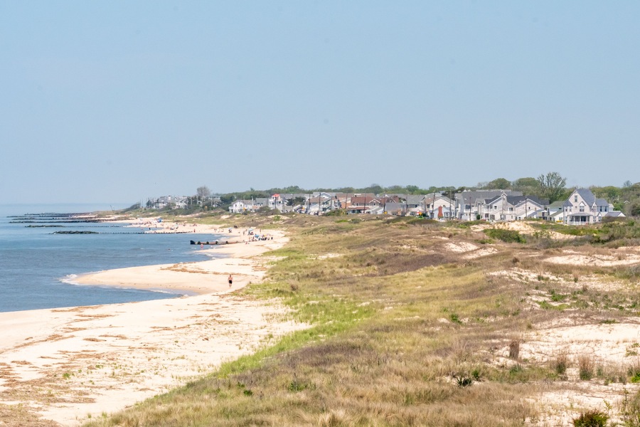 The beach and summer homes in North Cape May and Towne Bank New Jersey USA as seen from the water.