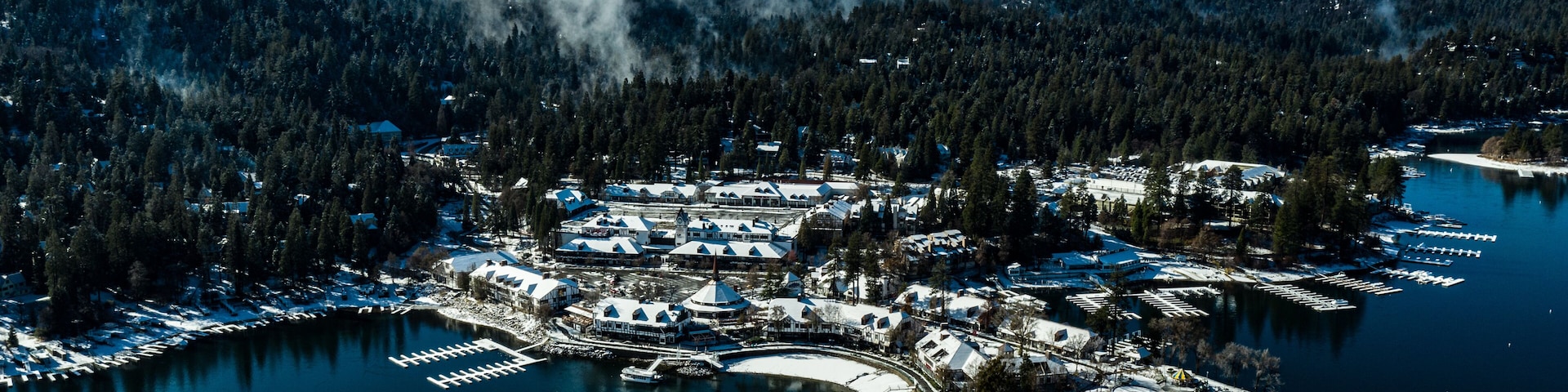 Aerial, drone view of Lake Arrowhead, California on a winter's day after a snow storm