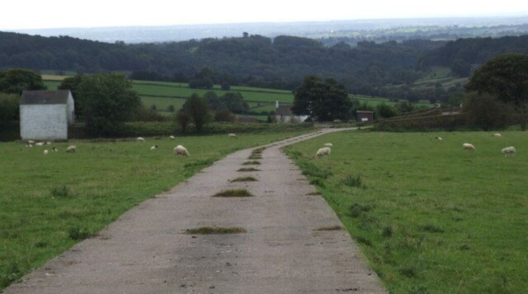 Looking down to Trubshaw's Caldon Tramway Taken from just below the A52, this shows the 1847 Caldon Tramway crossing an embankment adjacent to the white building. An overbridge can be seen at the right hand end of the bank, where the farm road wriggles to cross it. Part of the tramway formation has been used by water services.