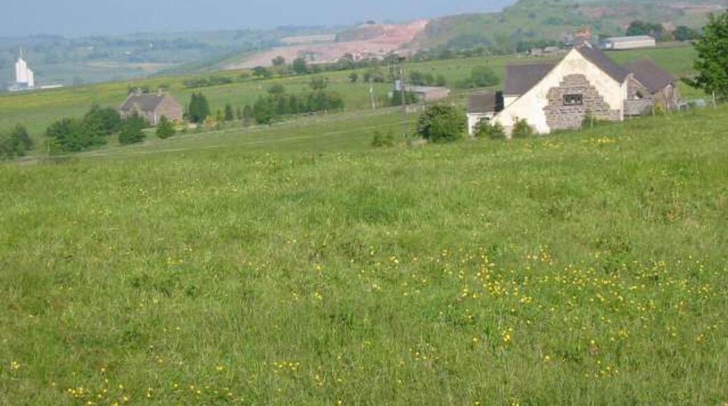 Windywaycross This view is taken looking to the east from Windywaycross. This location is high up on the Staffordshire moorlands. In the distance can be seen some of the buildings and the scar of the massive Cauldonlow limestone quarries.