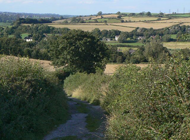 Bridle Lane This connects Lower and Upper Hartshays. Classified as a restricted byway, it was clearly once important enough to have a tarmac/asphalt surface. Visible dwellings all belong to the hamlet of Lower Hartshay.