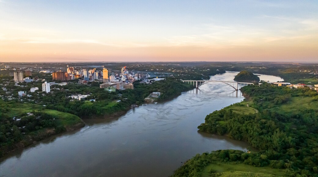 Border between Brazil and Paraguay and connects Foz do Iguaçu to Ciudad del Este. Ponte da Amizade in Foz do Iguaçu. Aerial view of the Friendship Bridge with Paraná river..