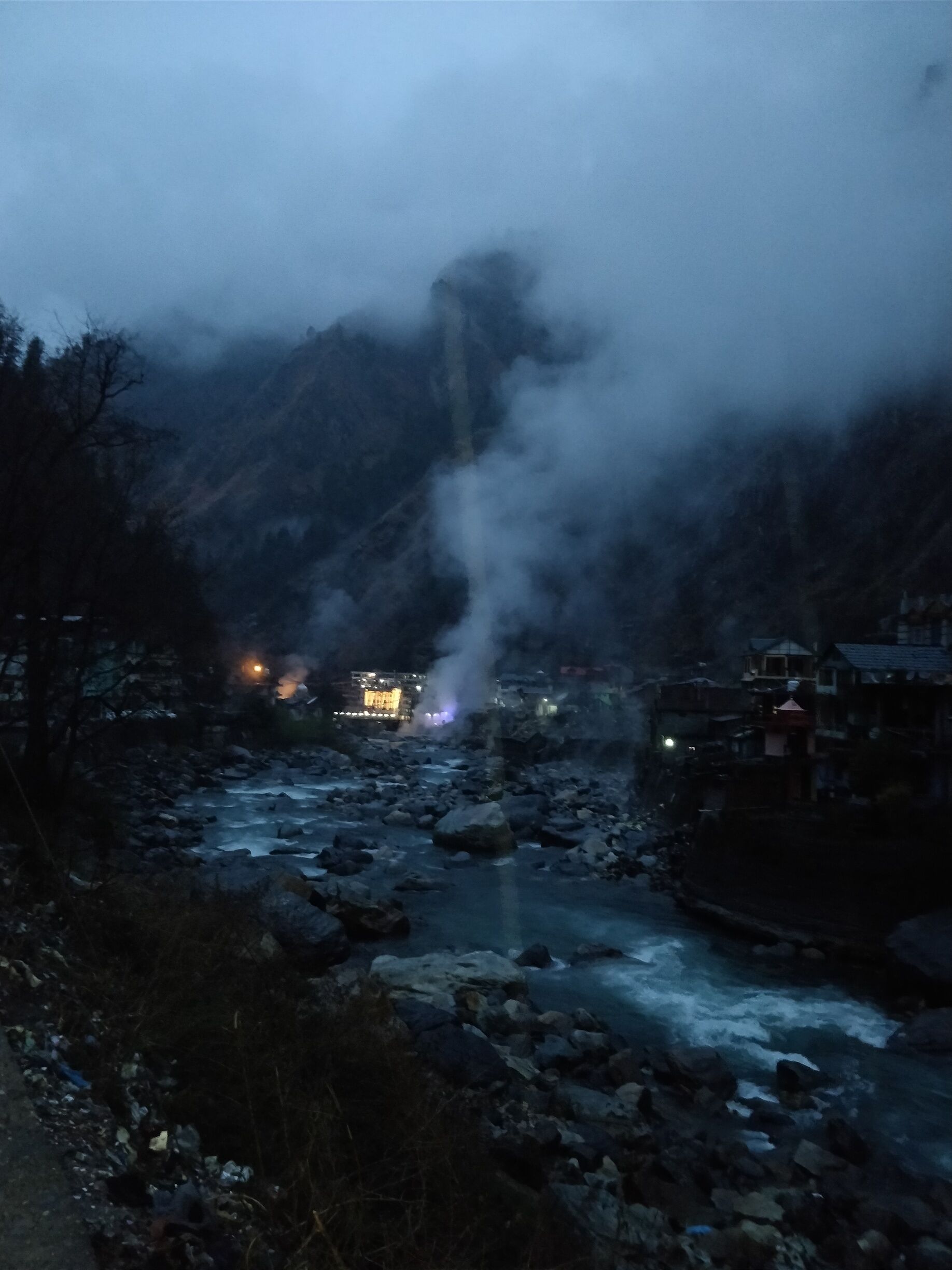 Hot springs raise a mystique steam in the distance 
