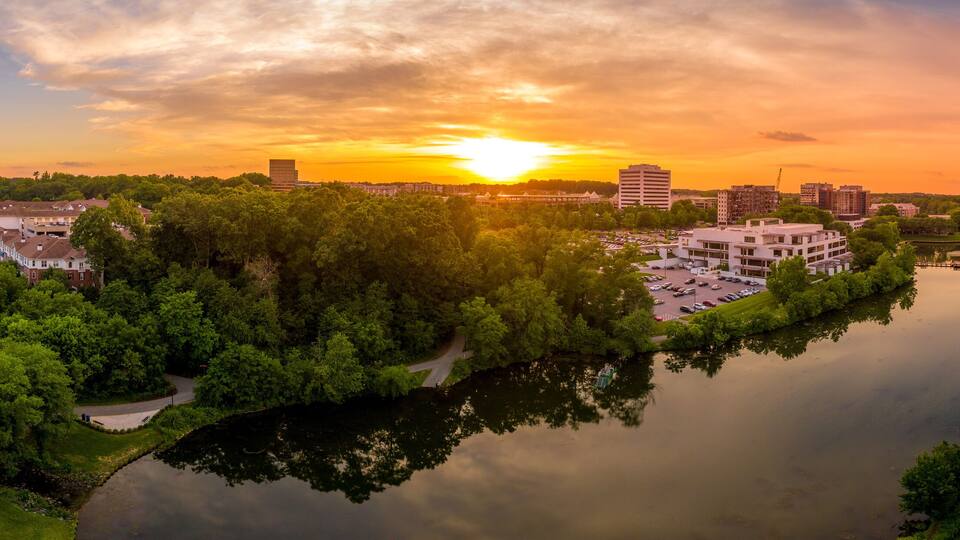Aerial sunset panorama of Columbia Town Center in Maryland new Washington DC with office buildings and the Columbia Mall