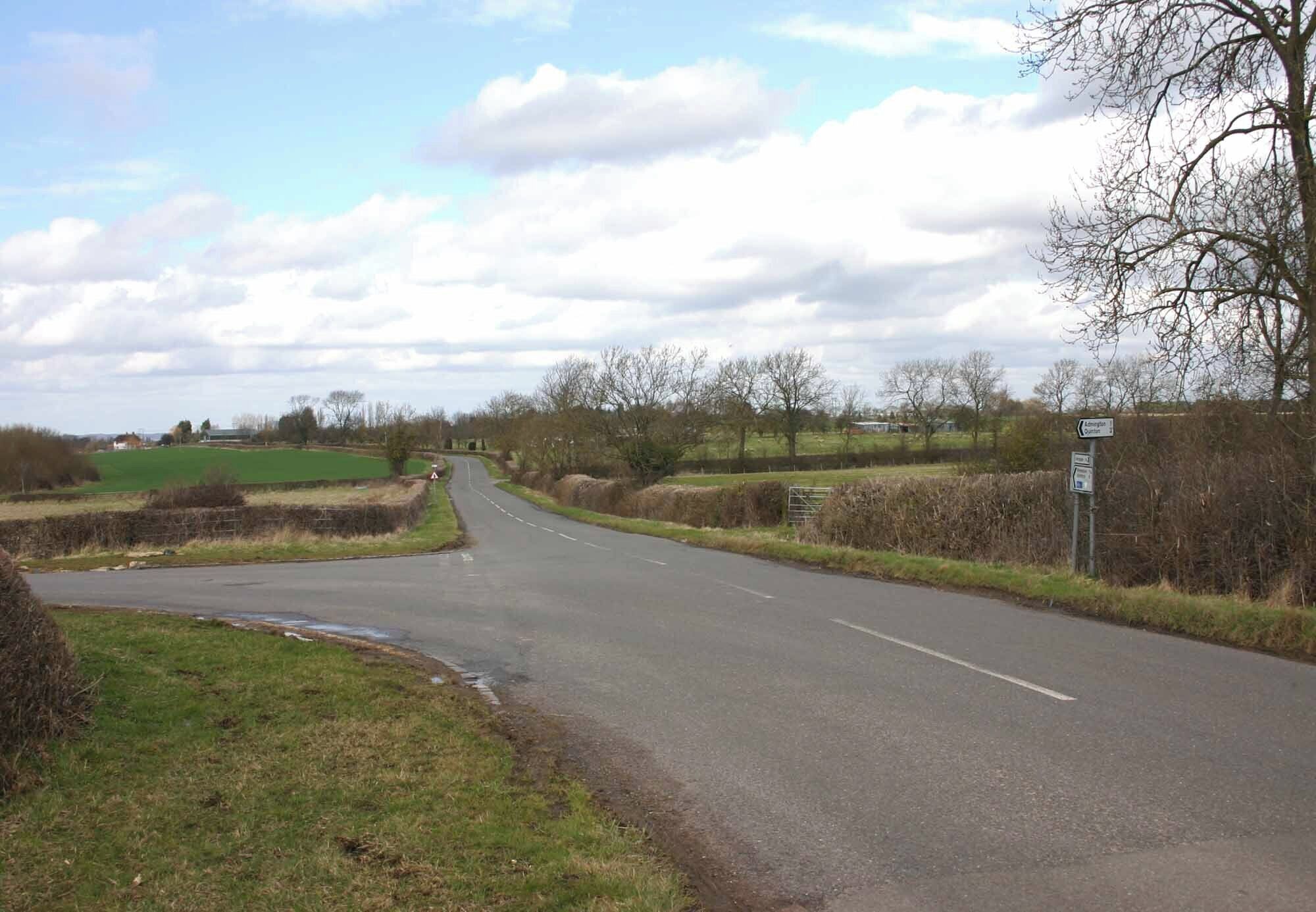 Stratford Road, near Admington Looking north across large staggered junction. Left for Admington, straight on for Wimpstone, right for Crimscote.