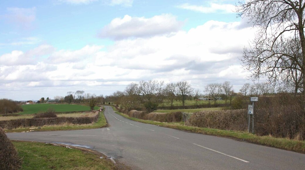 Stratford Road, near Admington Looking north across large staggered junction. Left for Admington, straight on for Wimpstone, right for Crimscote.